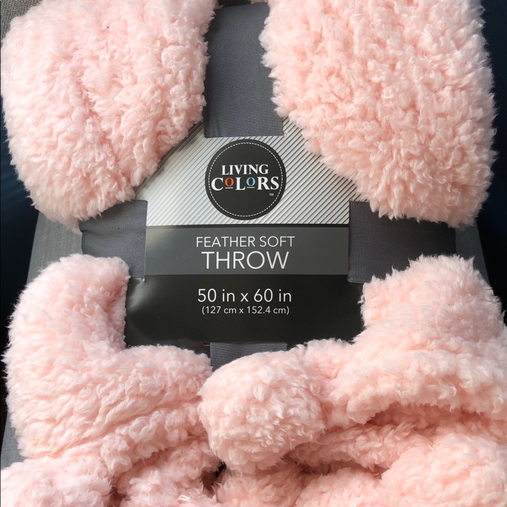 Fuzzy pink throw blanket